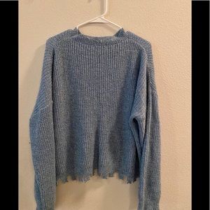 Nice wool sweater with stylish torn/cut bottom